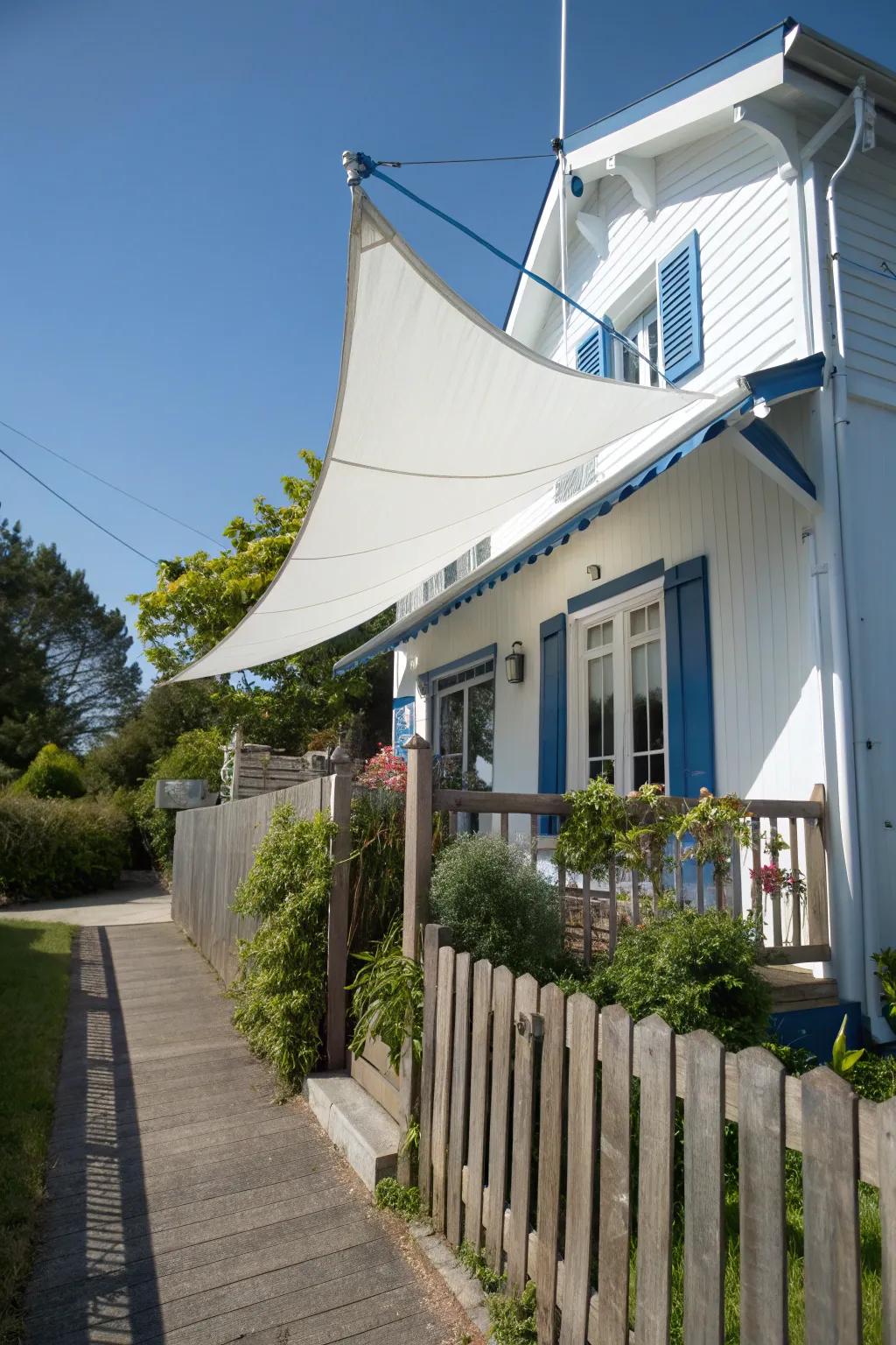 Fabric sail awnings offer a breezy coastal charm.