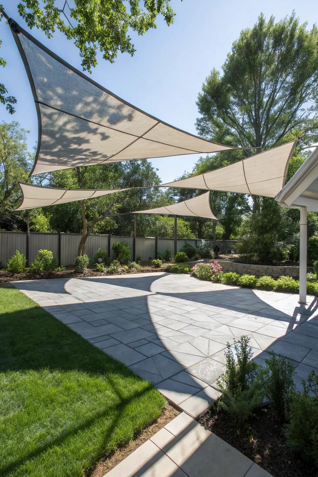 Modern shade sails add a sleek touch to your backyard while providing essential shade.