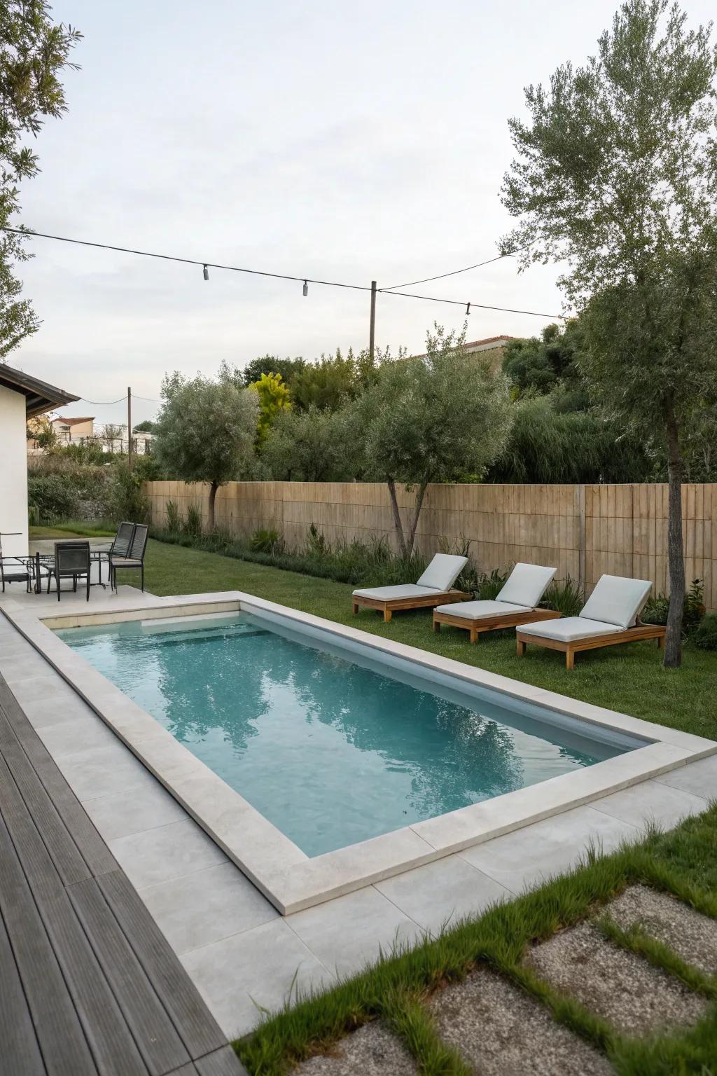 Embrace modern minimalism with a sleek rectangular pool design.