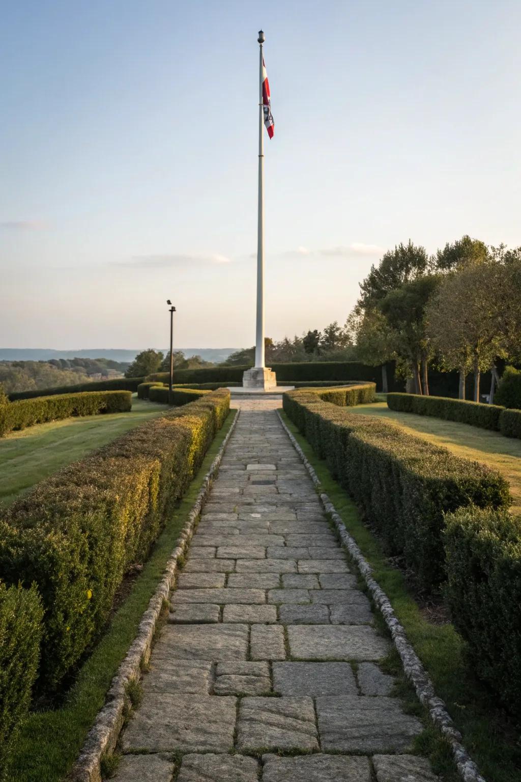 A welcoming walkway enhances the flagpole's presence.
