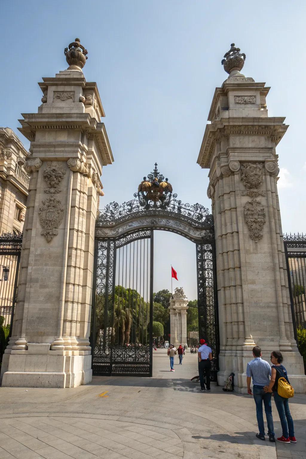 Imposing stone pillars create a majestic entrance.