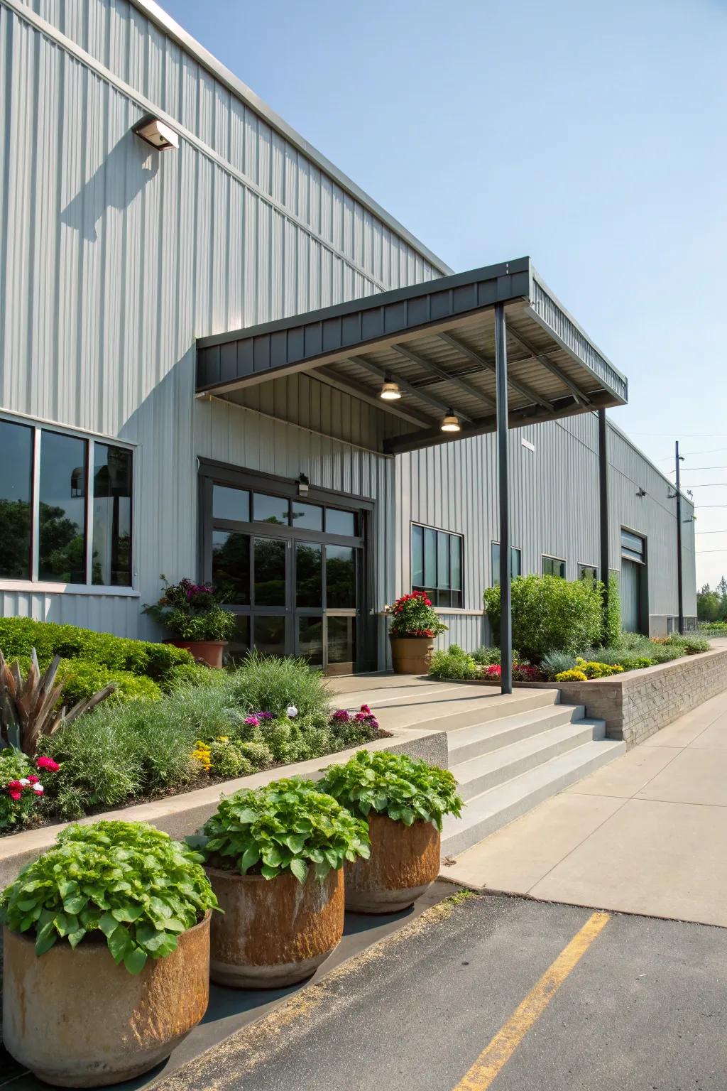 A commercial metal building with welcoming planters.