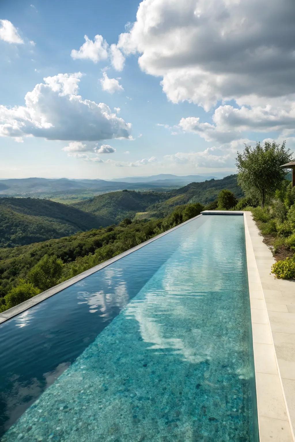 A narrow infinity pool with stunning views over the landscape.