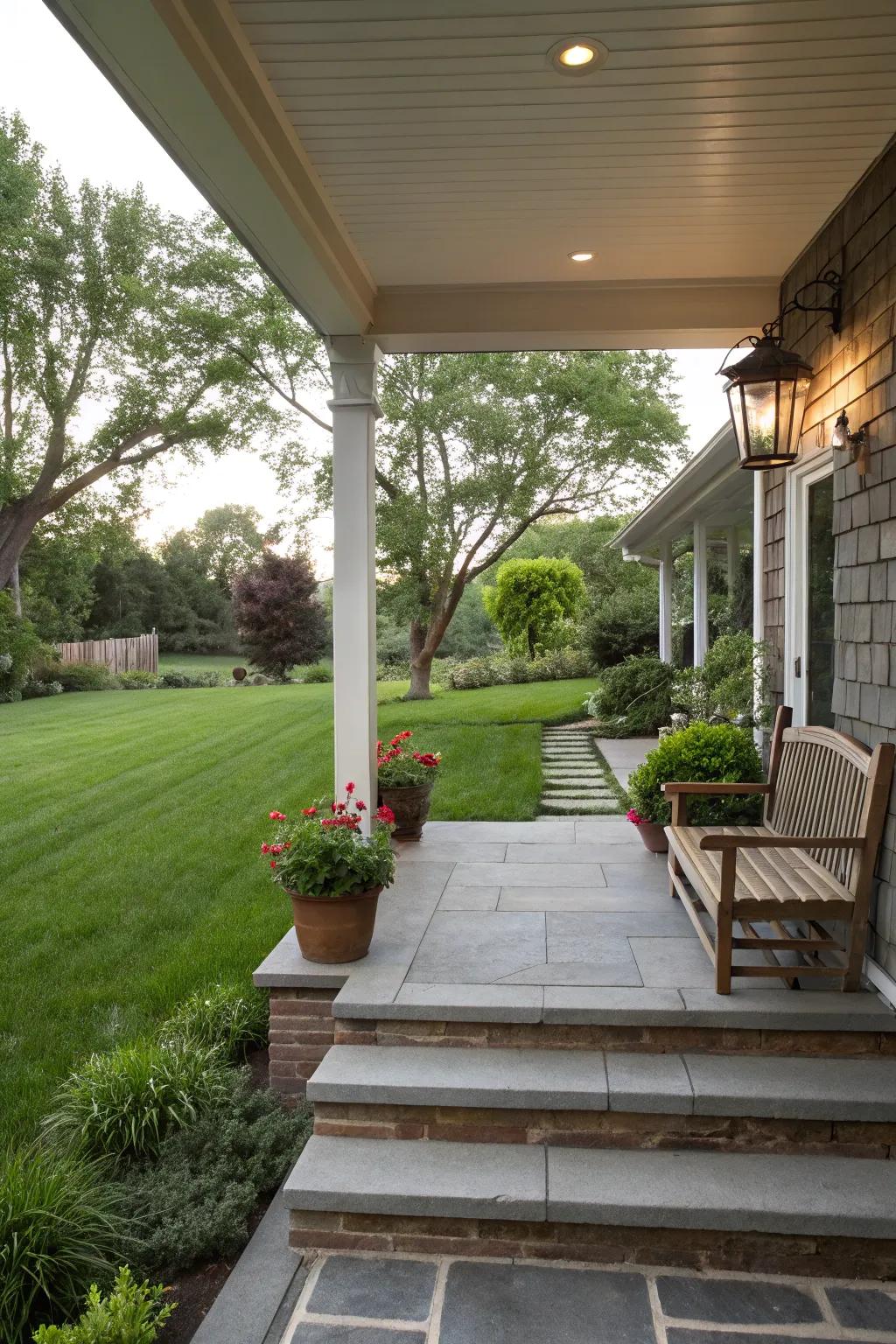 An open front porch that flows naturally into the surrounding garden.