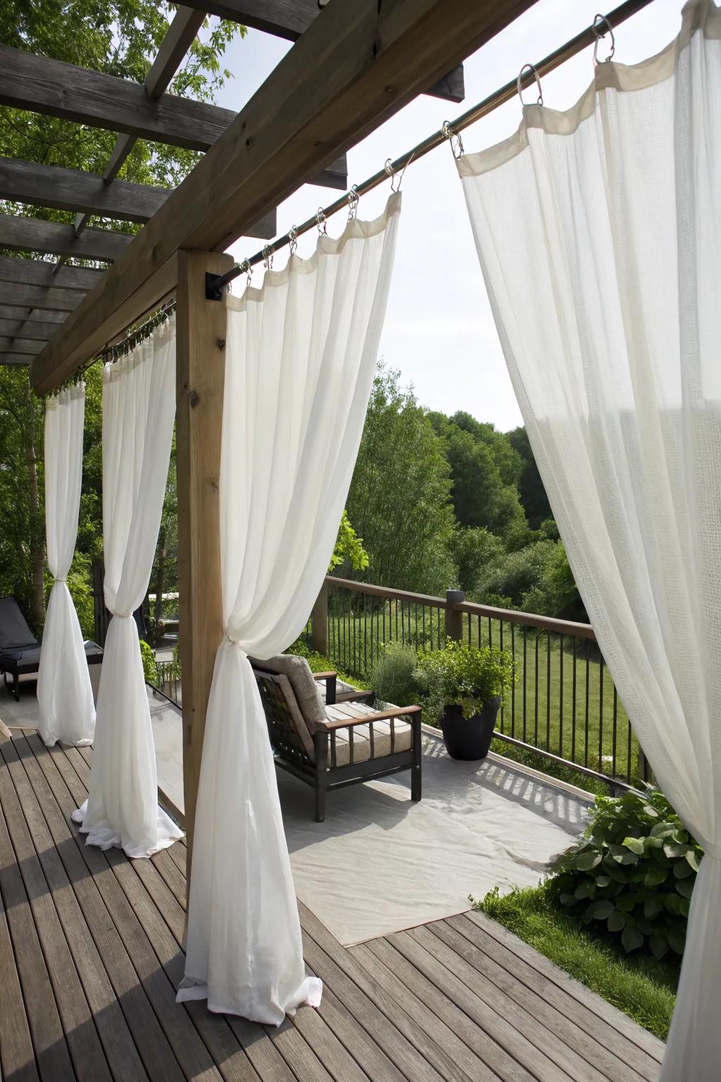 Outdoor curtains add elegance and privacy.