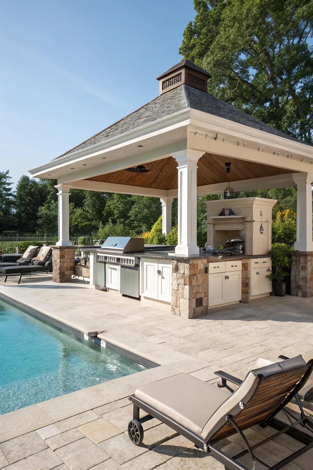A poolside pavilion with an outdoor kitchen perfect for entertaining.