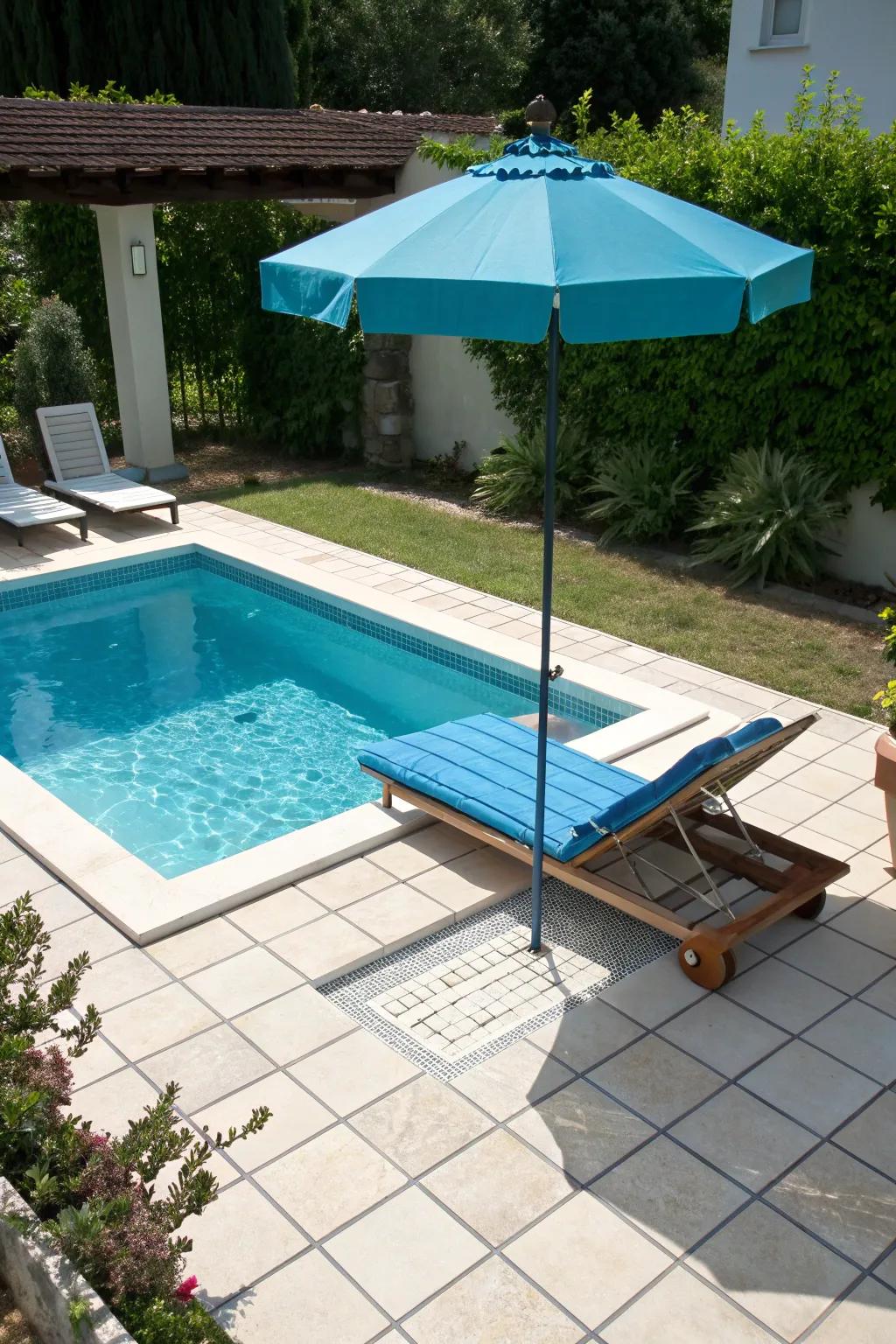 A vibrant umbrella adds both color and shade to the pool area.