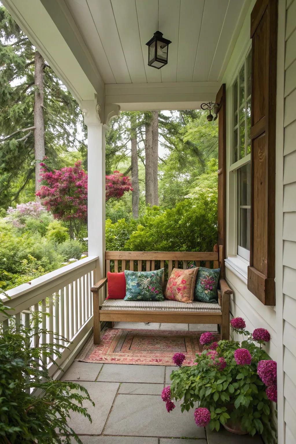 A bench with cushions provides ample seating with a pop of color.