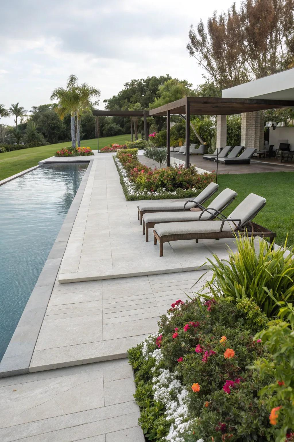 A safe and stylish composite walkway enhancing a poolside retreat.