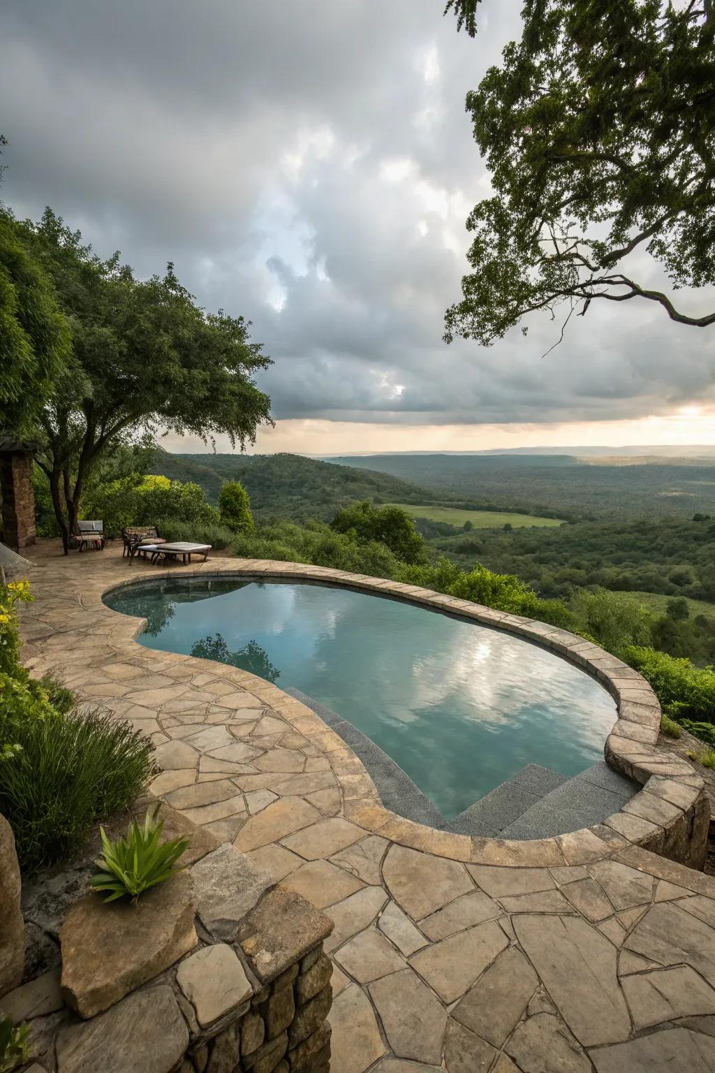Natural stone decking complements the pool's design.