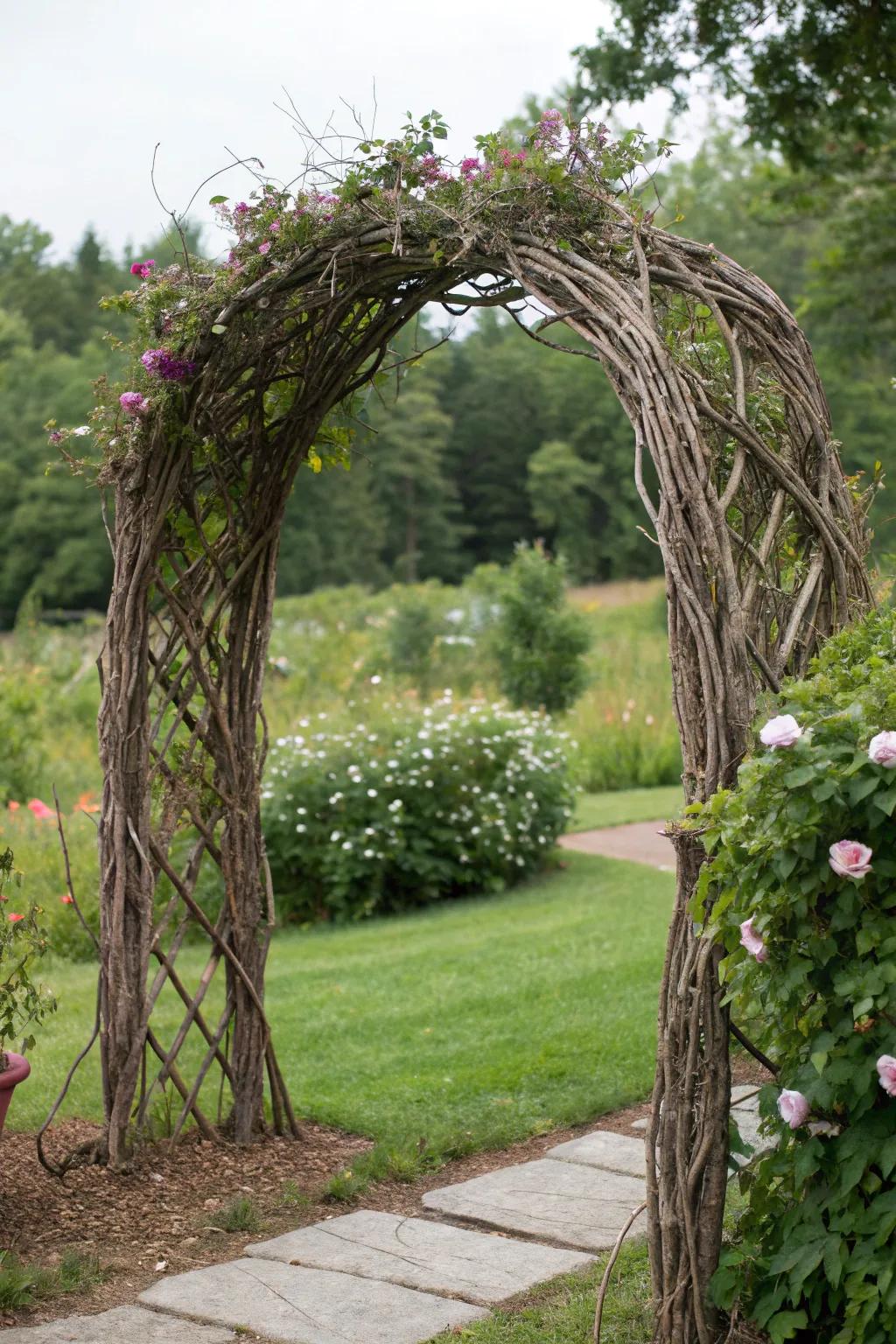 A rustic twig garden arch blending naturally with its surroundings.