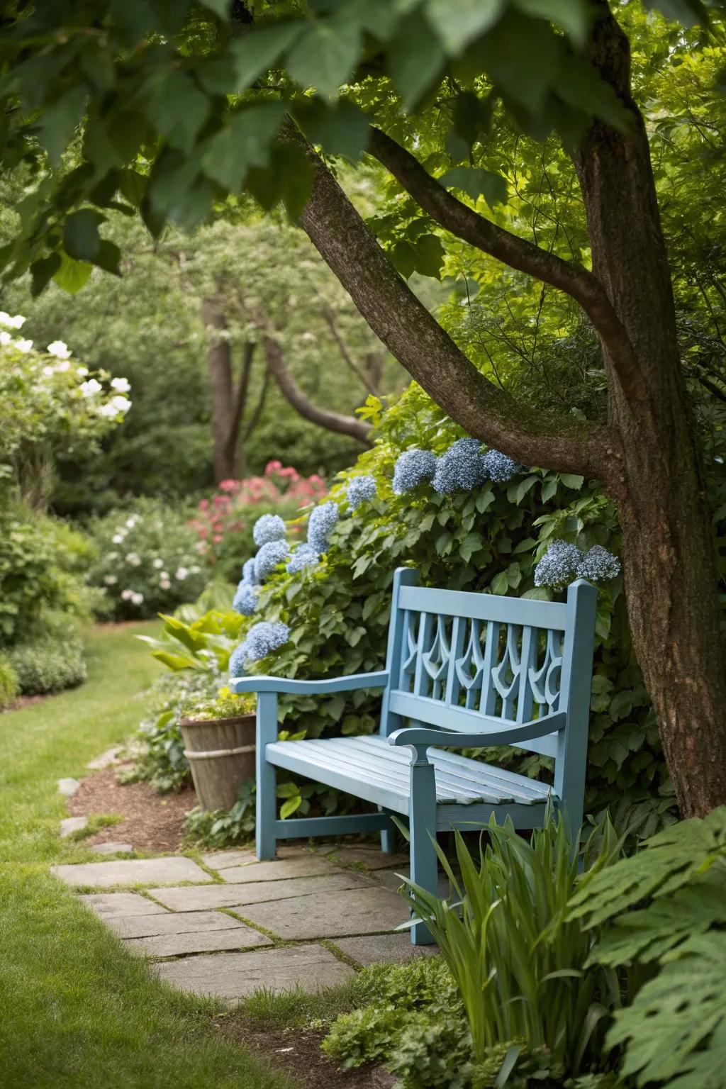 A blue bench evokes a sense of calm and relaxation in any garden.