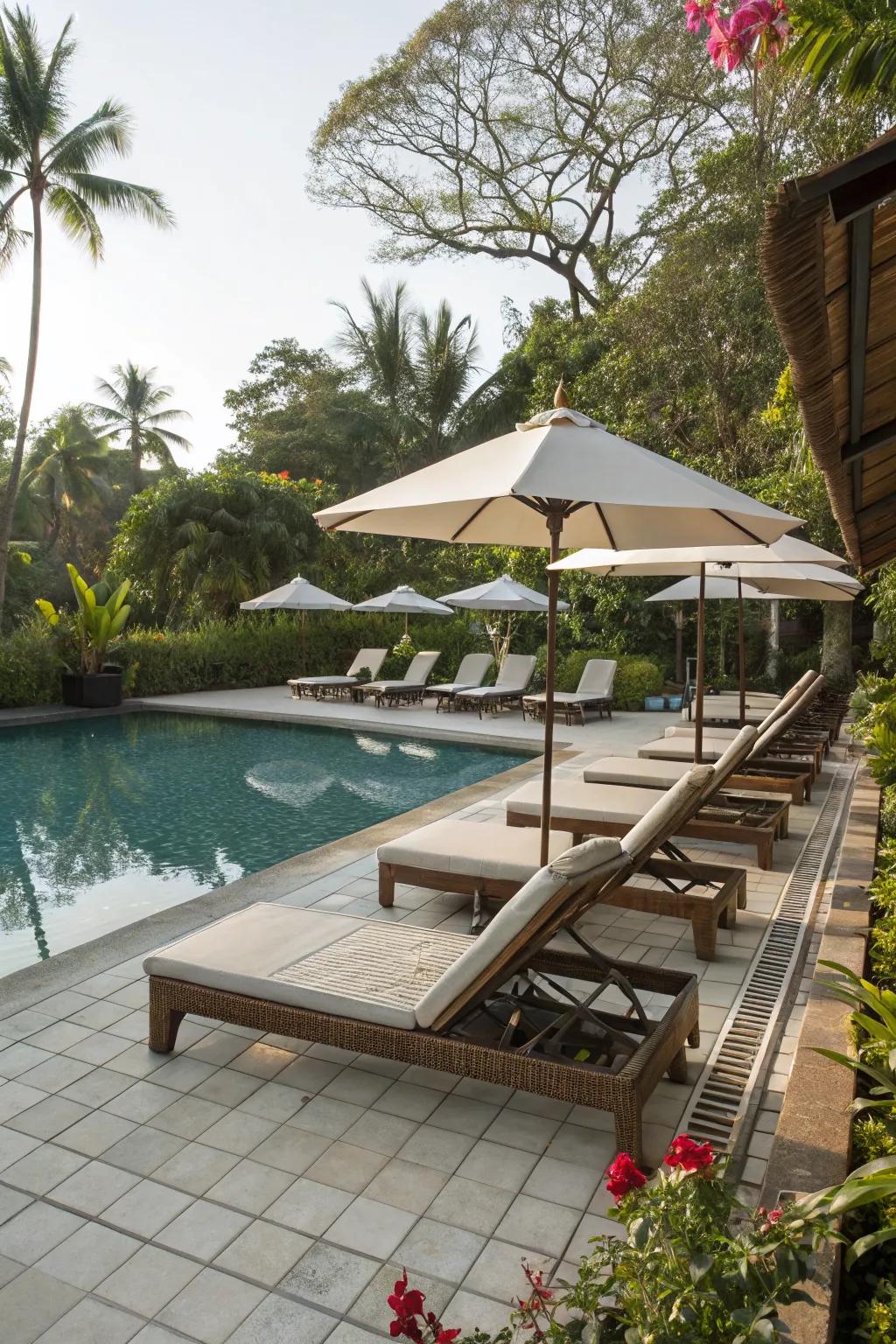 Comfortable seating and sun loungers create a relaxing poolside retreat.