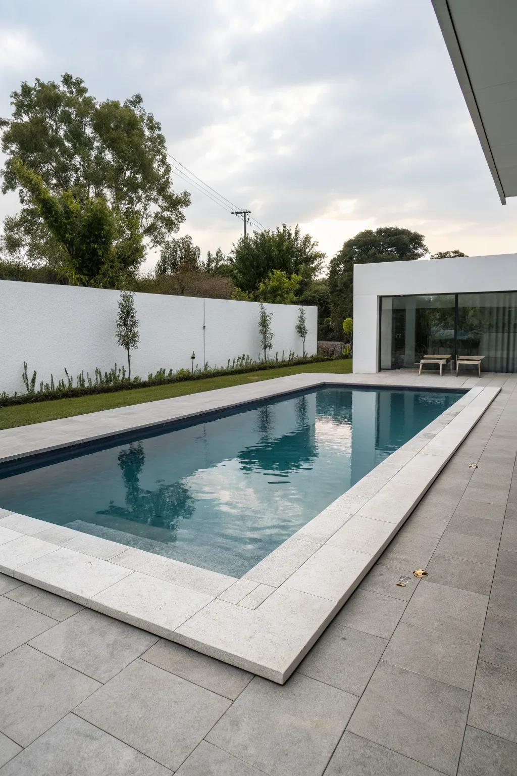 A sleek geometric inground pool that exudes modern elegance.