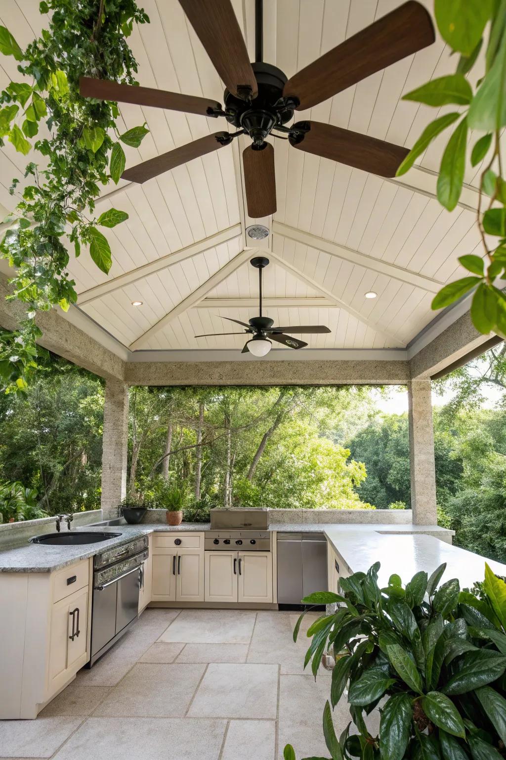 A ceiling fan adds a touch of comfort and style to this outdoor kitchen.