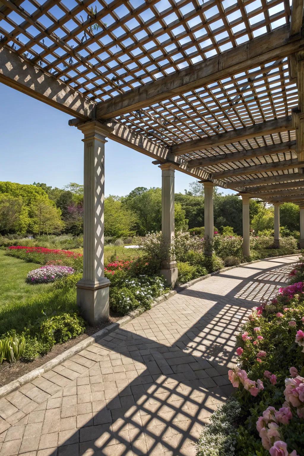 A sunlit pergola-style pavilion in a vibrant garden setting.