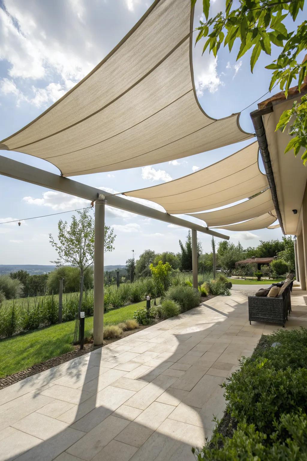 Achieve tranquility with neutral-toned shade sails.