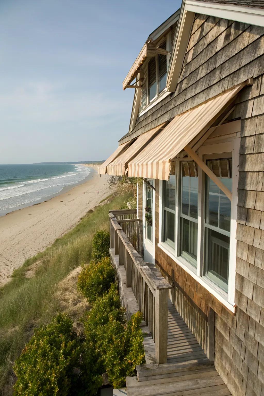 Weathered wood awnings bring tranquil coastal charm to seaside homes.
