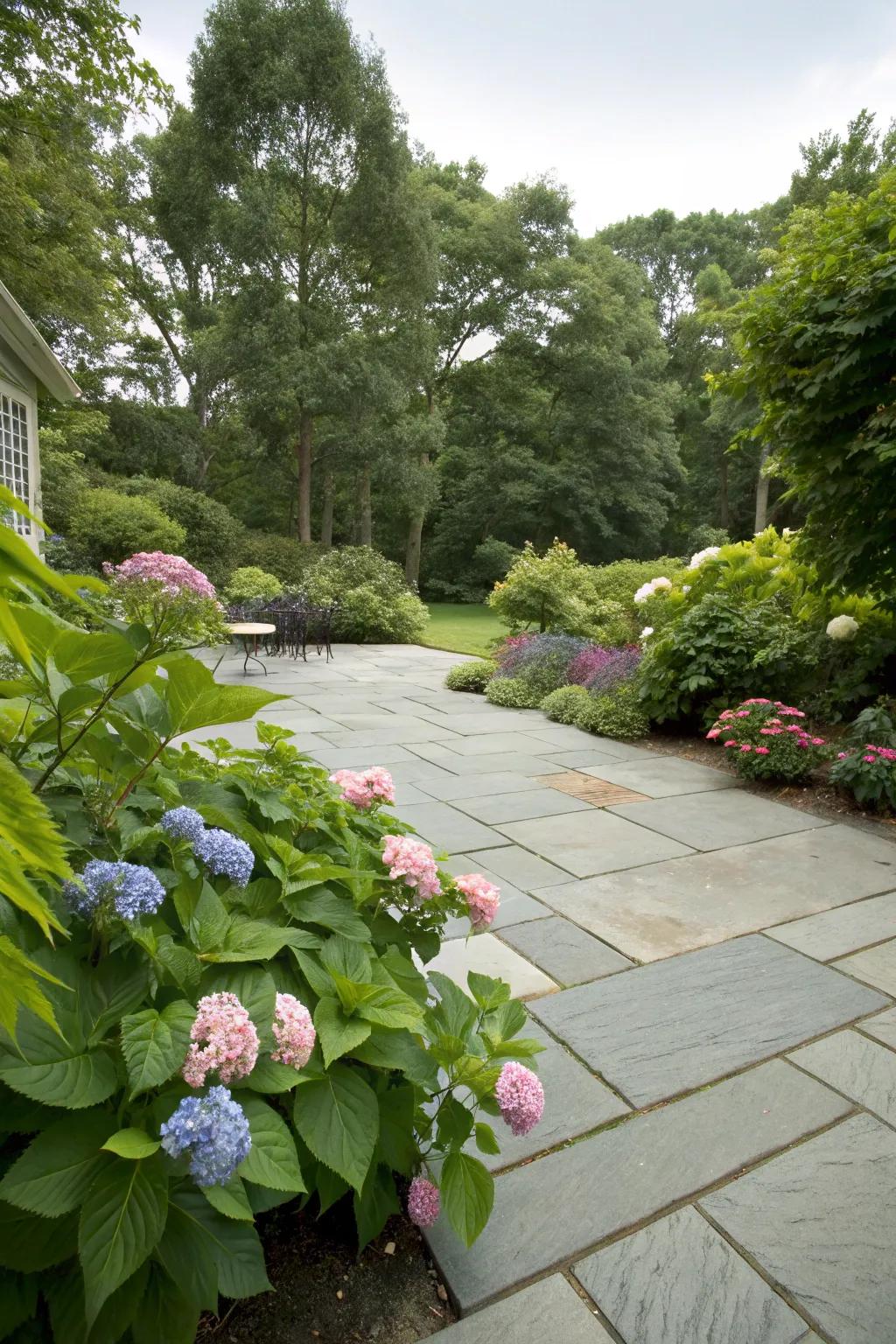 Let nature embrace your bluestone patio for a serene retreat.
