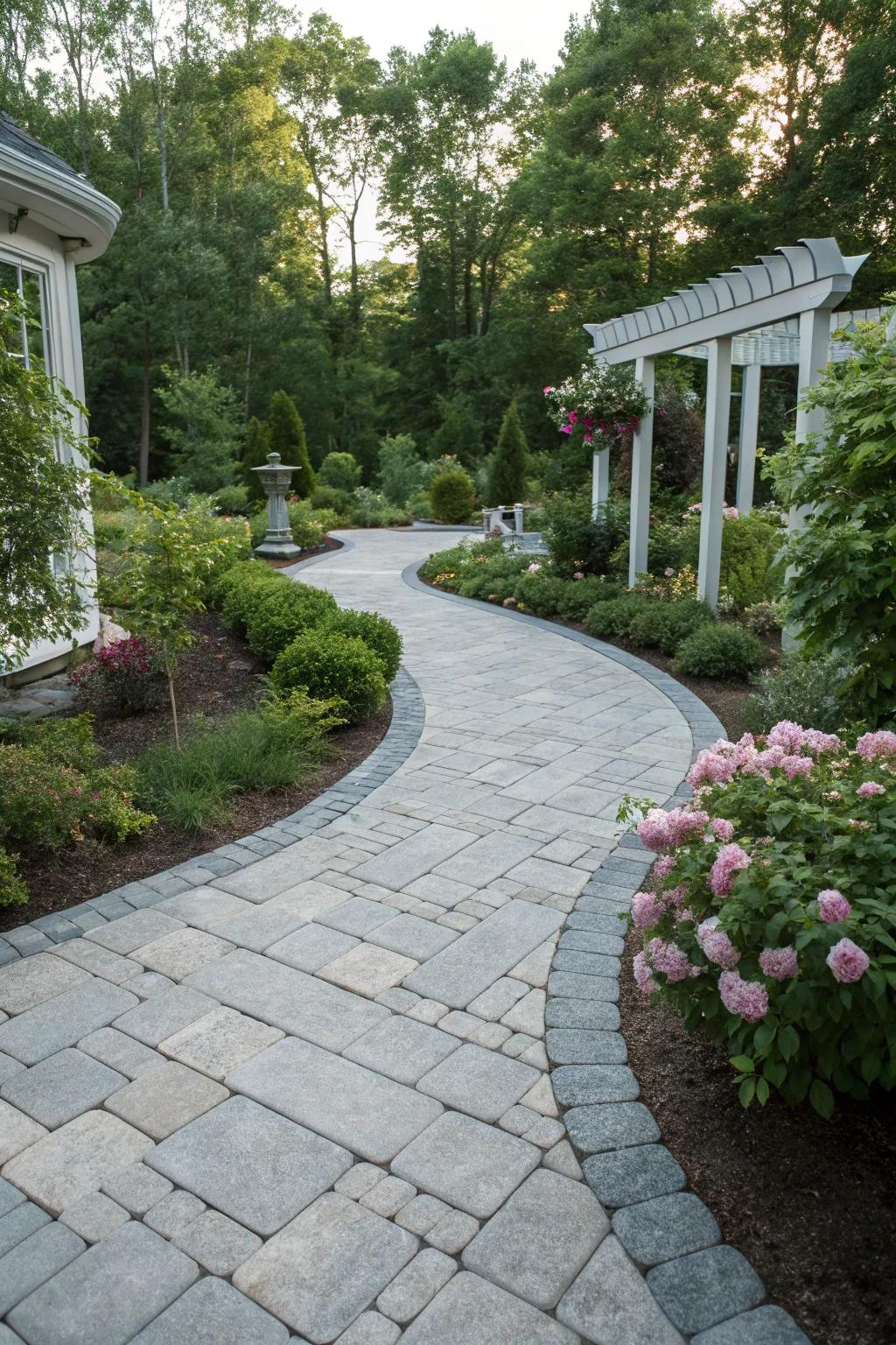 Gray paver pathways elegantly guide the flow through a landscaped garden.
