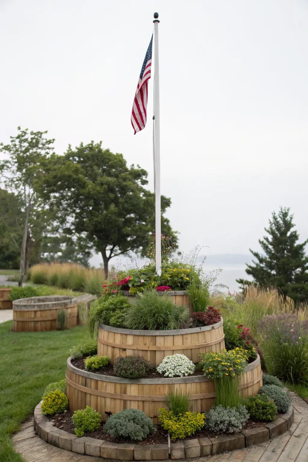 Tiered planters add dimension and vibrancy around the flagpole.