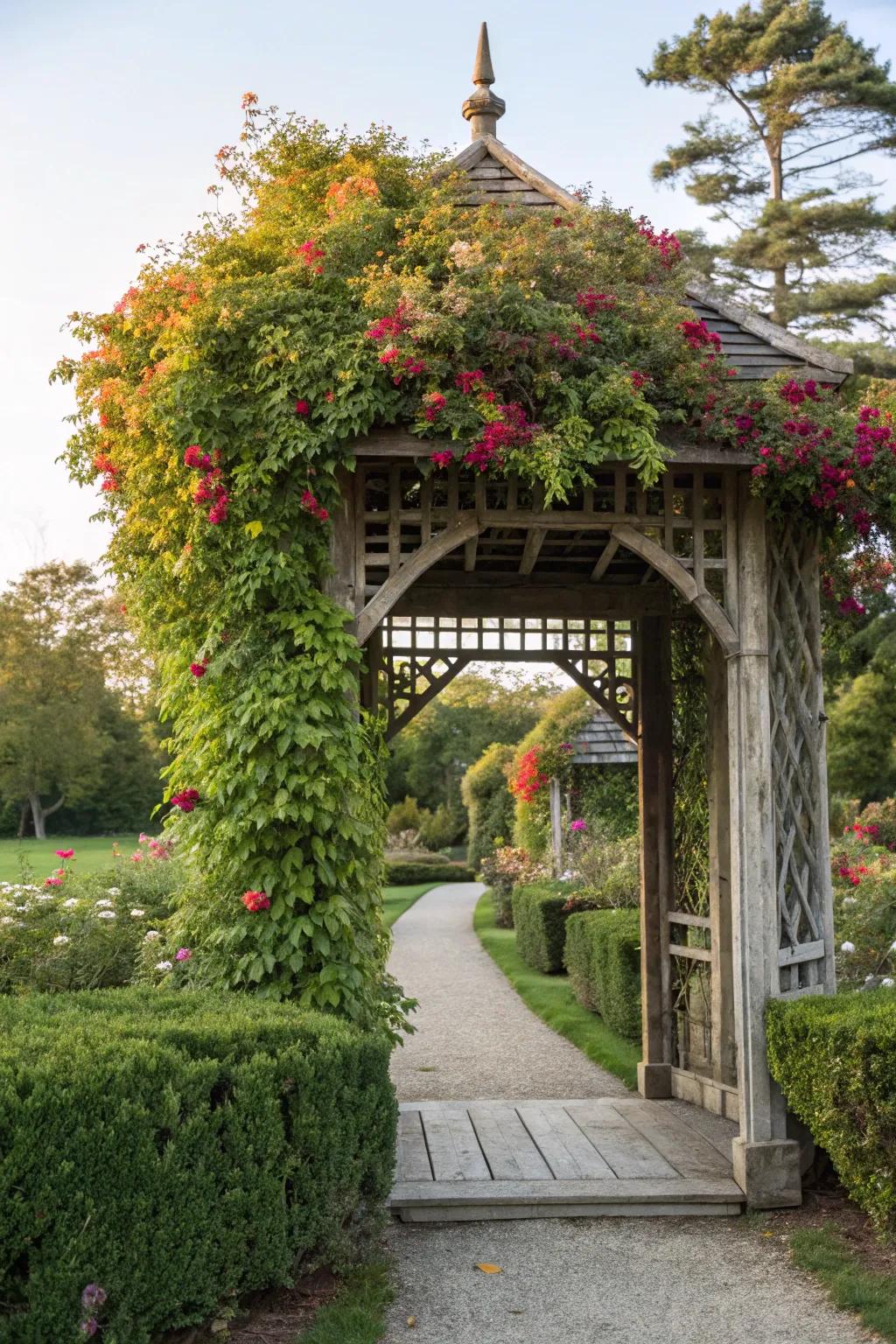 A pagoda-style arbor, draped in greenery, marks the entrance to a lush garden.