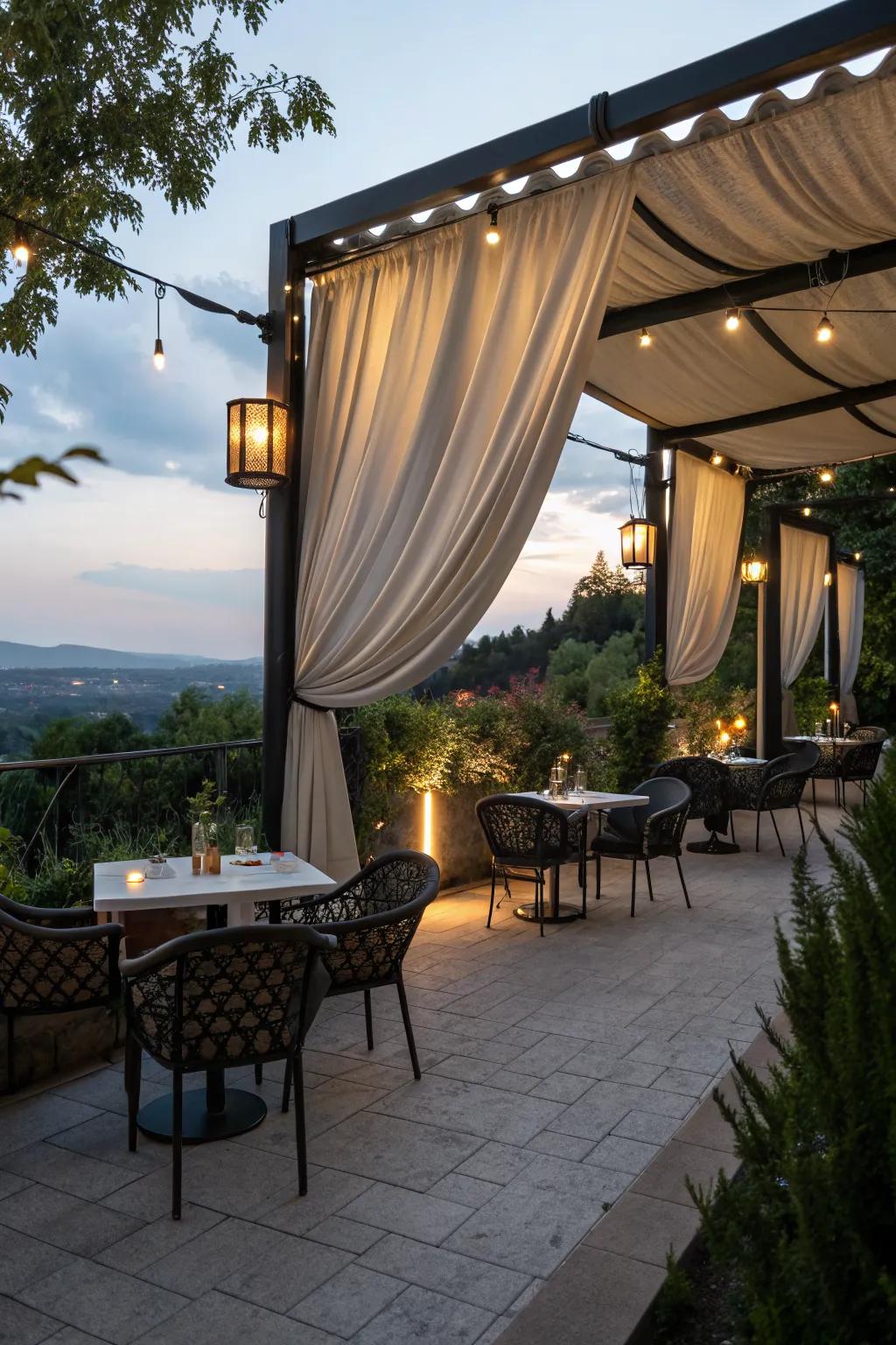 An elegant patio with a draped fabric canopy.
