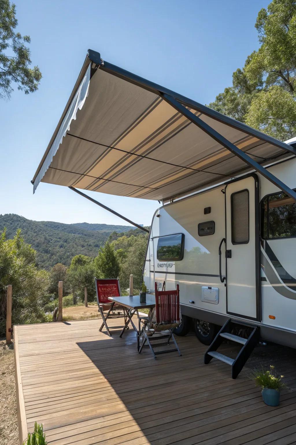 A camper deck with a retractable awning that offers shade and comfort.
