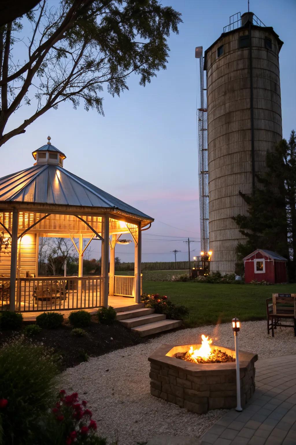 A warm fire pit enhances the silo gazebo's inviting atmosphere.