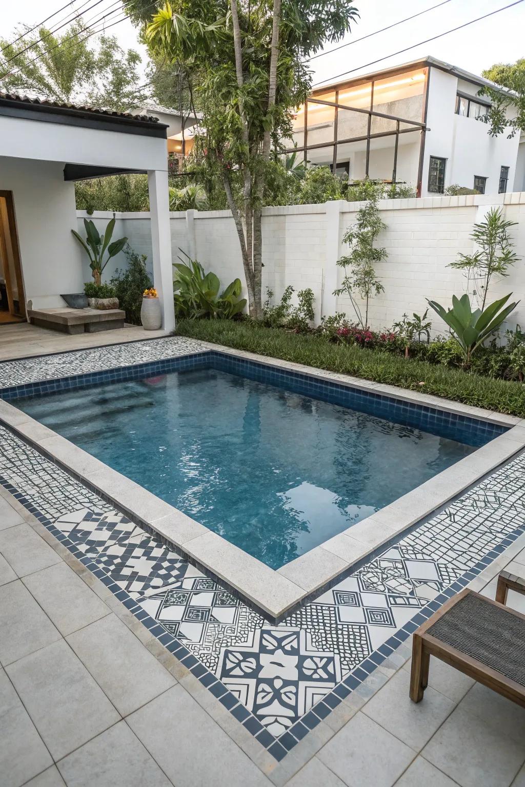 Geometric tiles add a modern edge to a square pool.
