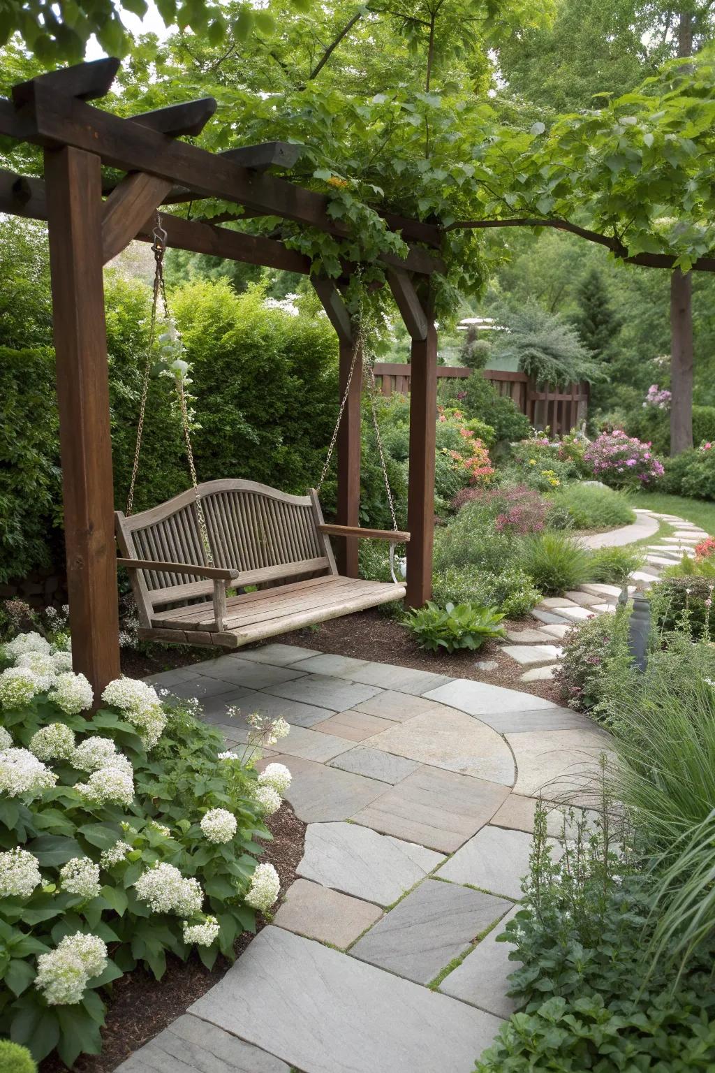 A swing perfectly integrated into a garden and patio setting.