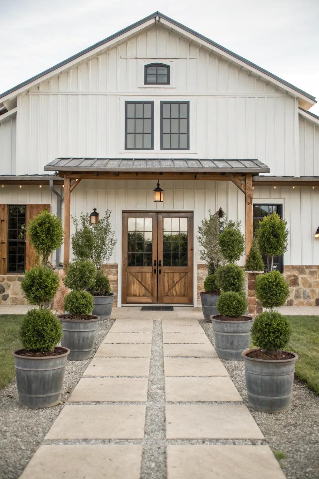 Symmetrical landscaping with potted plants for balance.