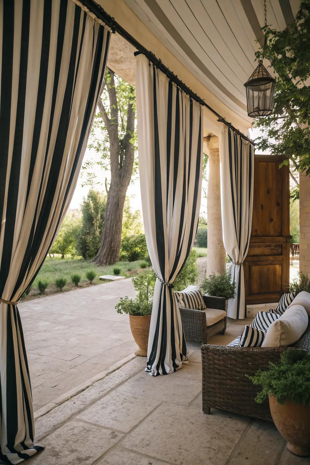 A cozy patio retreat with elegant striped curtains.