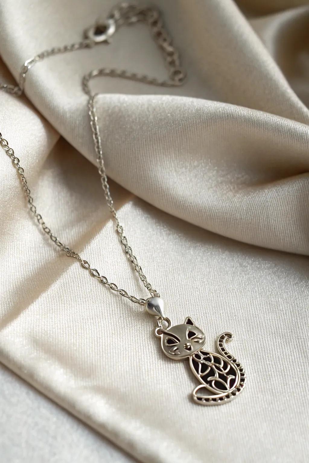 A delicate piece of jewelry to keep a beloved cat close.