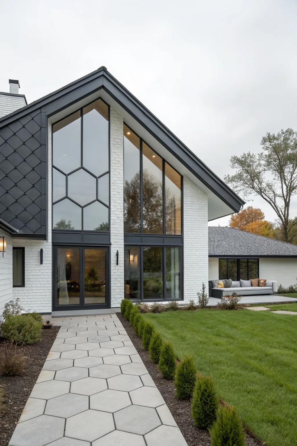 A geometric gable vent adds modern flair to this sleek home design.