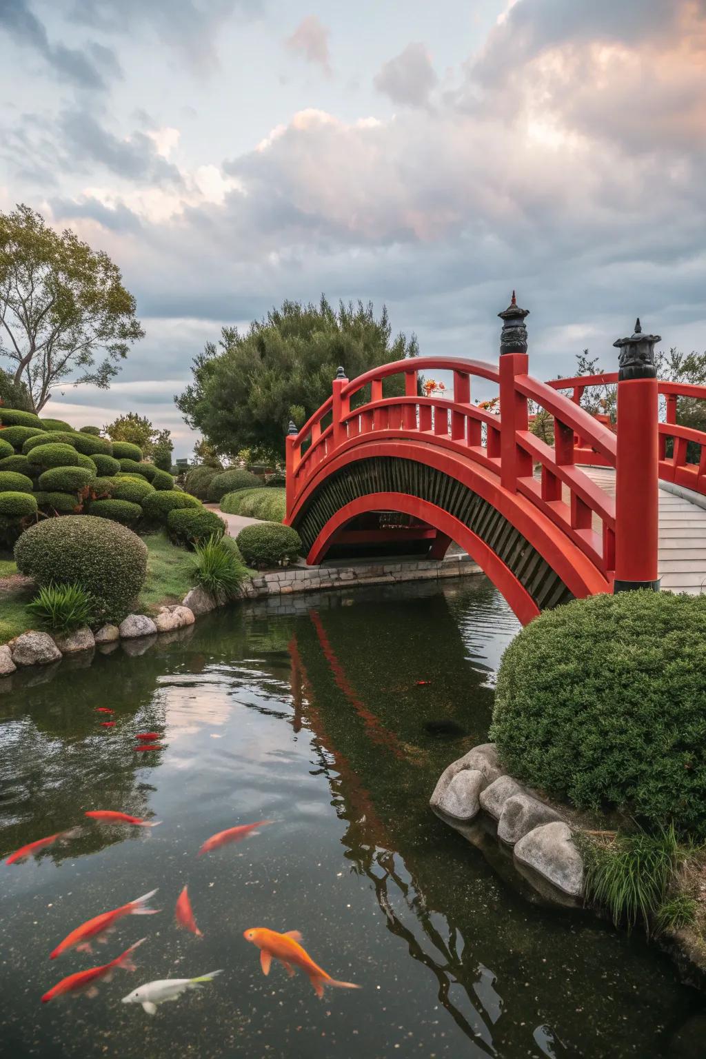 A red arched bridge enhances the tranquility of a Japanese garden.