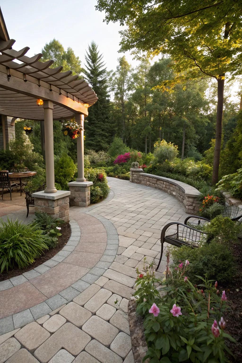 Stone pavers offer a timeless foundation for this half-moon patio