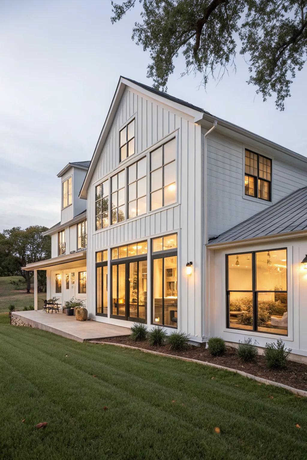 Expansive windows enhancing the modern farmhouse look.