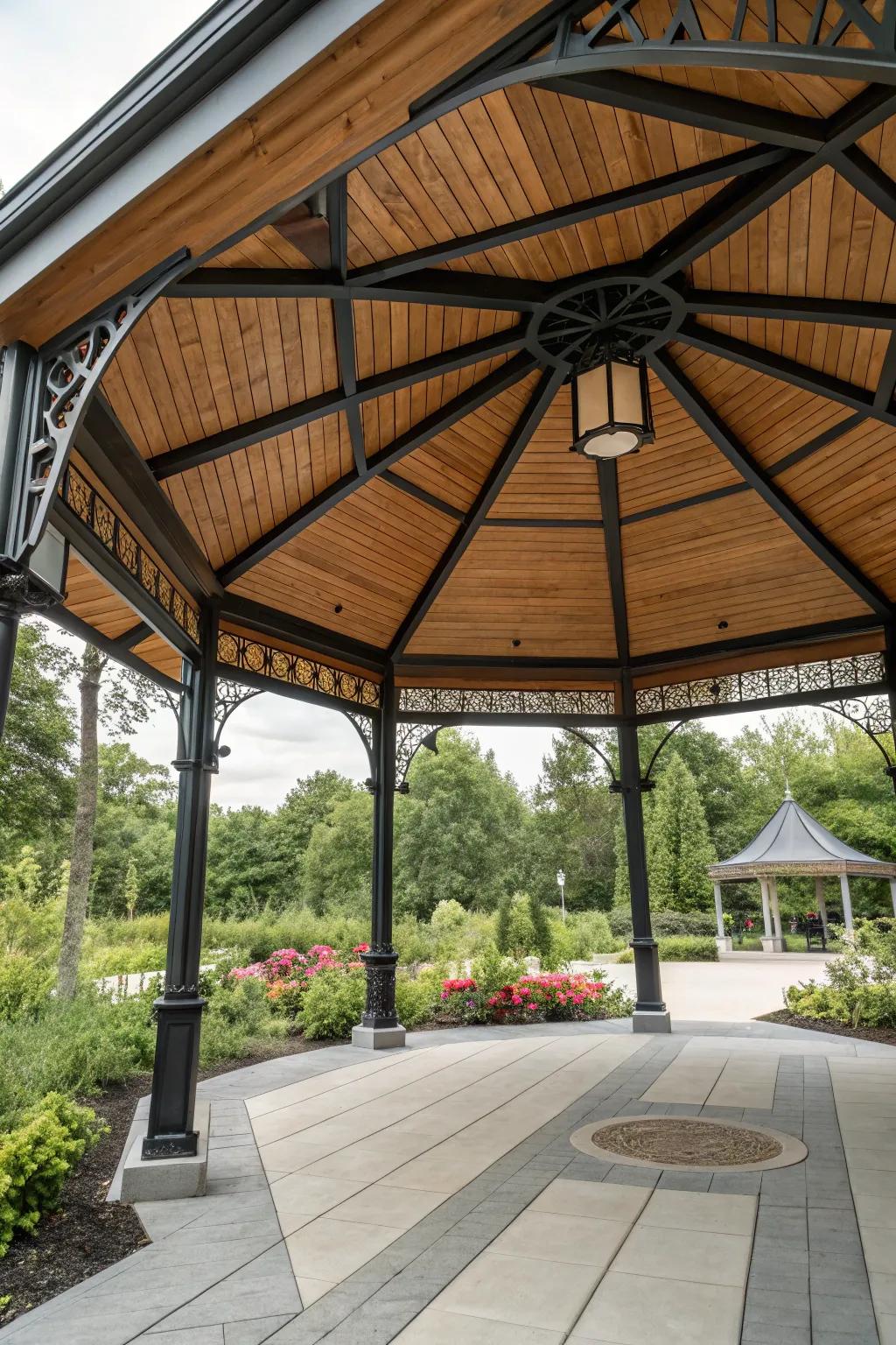 A pavilion showcasing a mix of wood and metal for a distinctive ceiling.