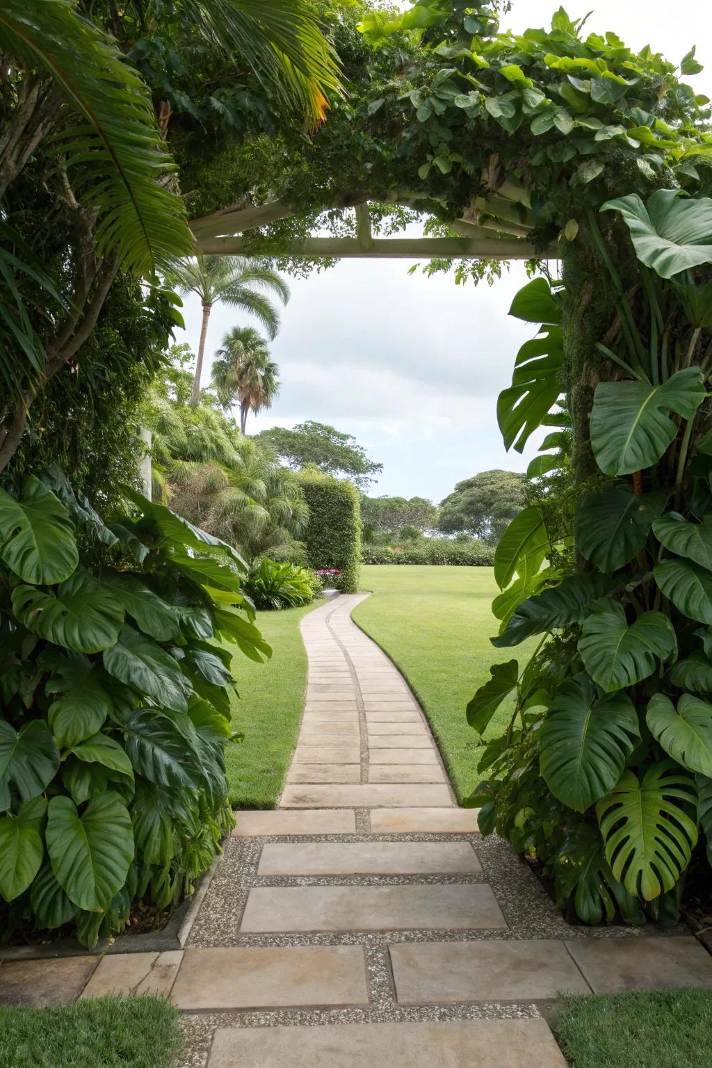 Line pathways with philodendrons for a charming garden entrance.