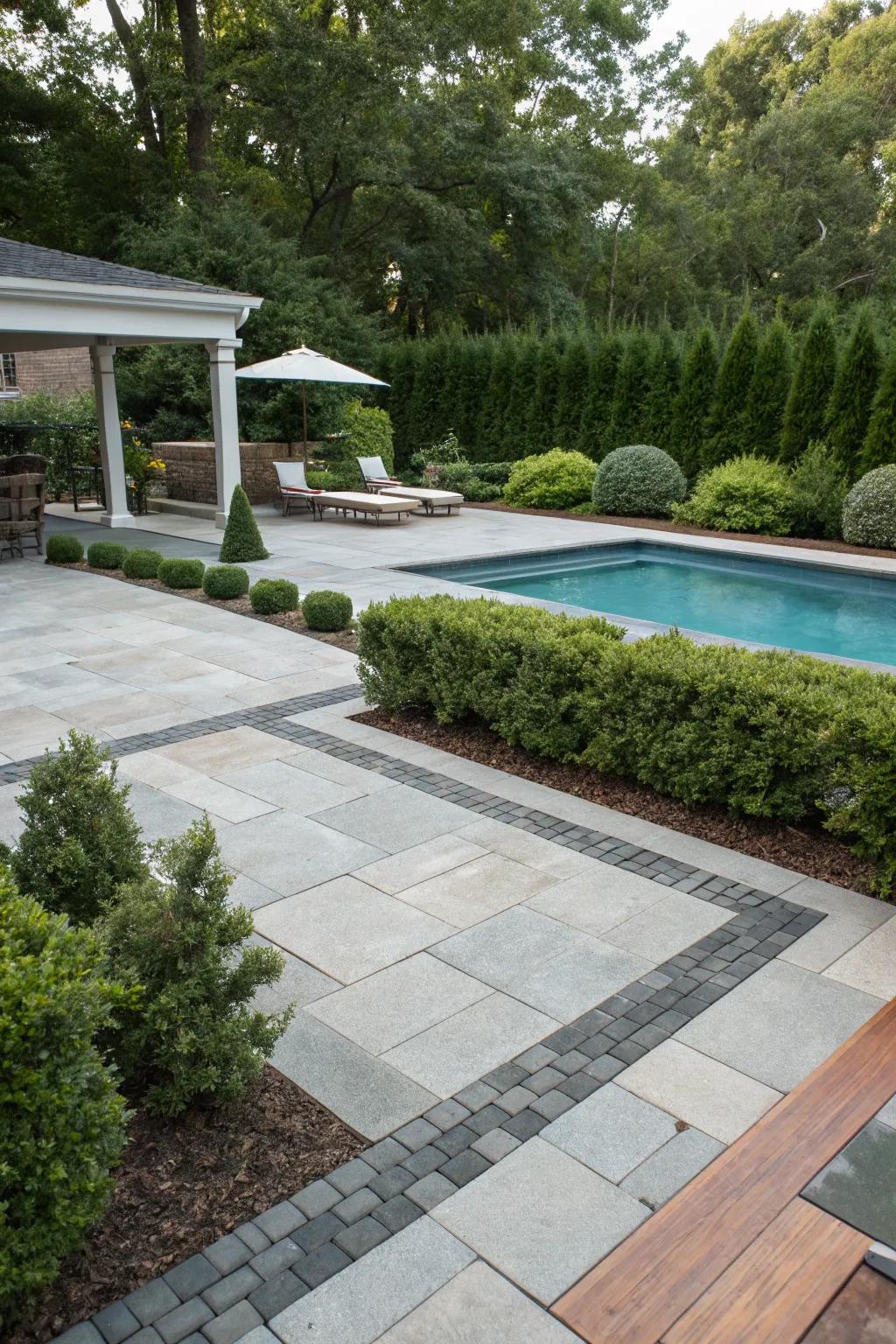 Mixed materials create a dynamic and unique pool deck design.