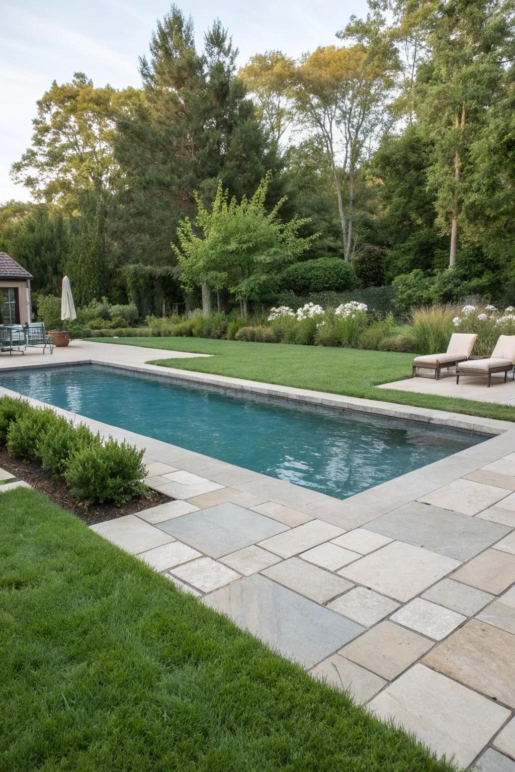 Seamless patio integration creates a unified and elegant pool design.