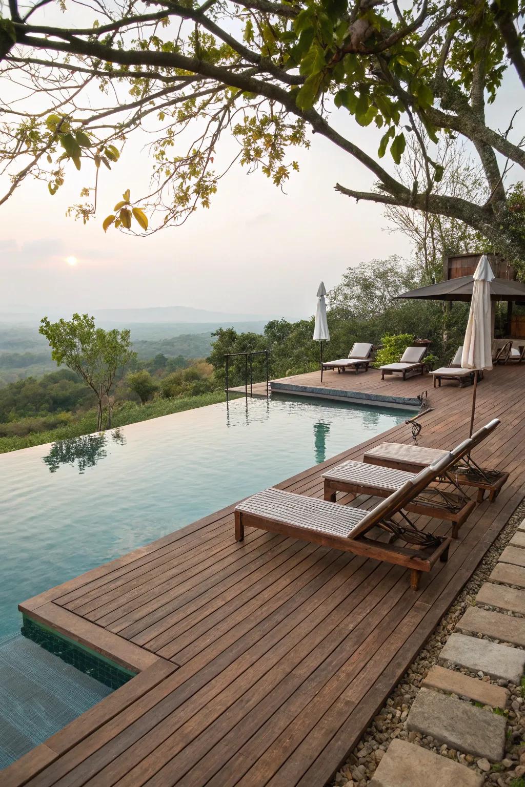 A pool area featuring a warm wooden deck and comfortable seating.