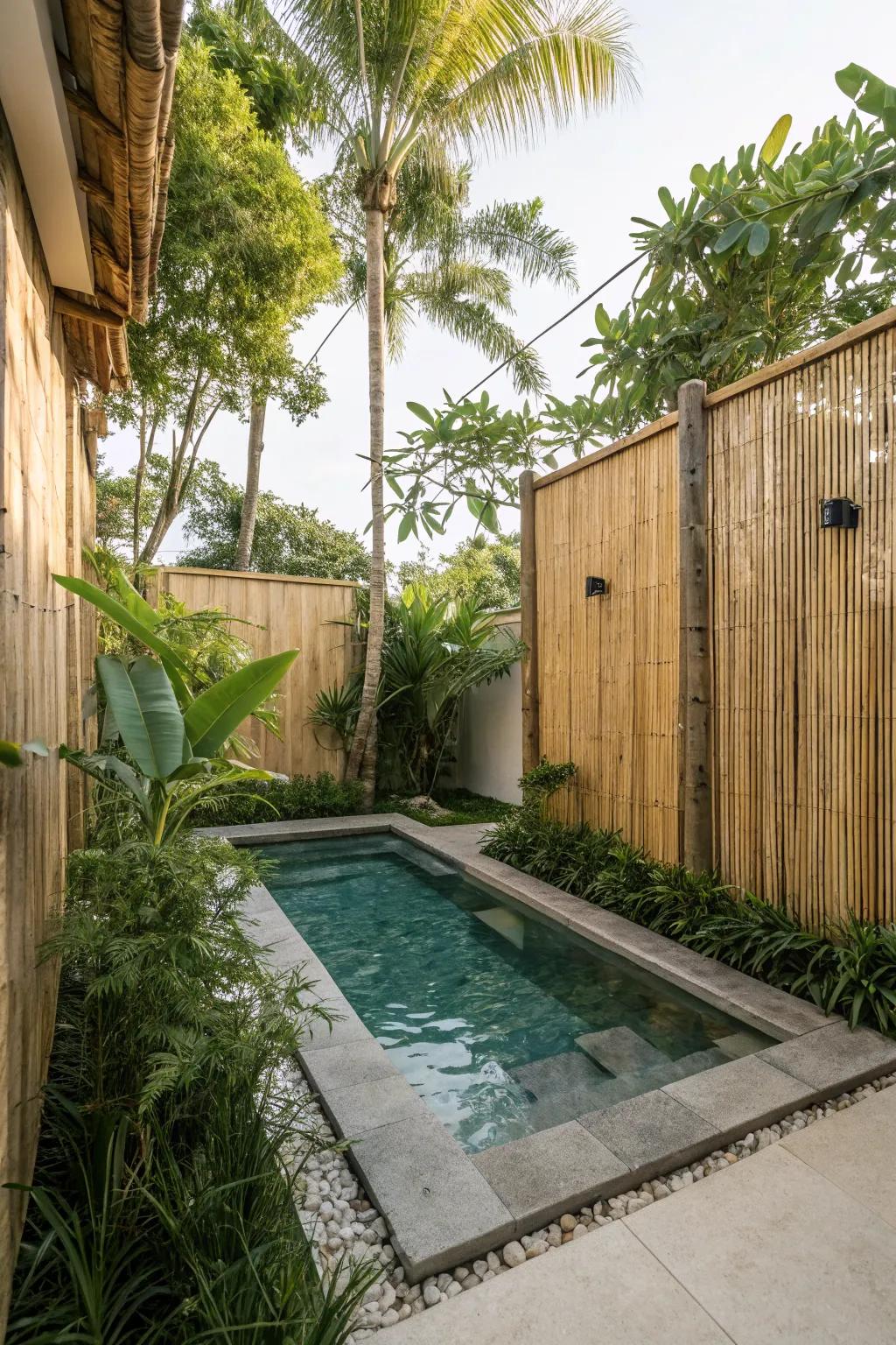 Bamboo screens offering privacy and style around a small pool.