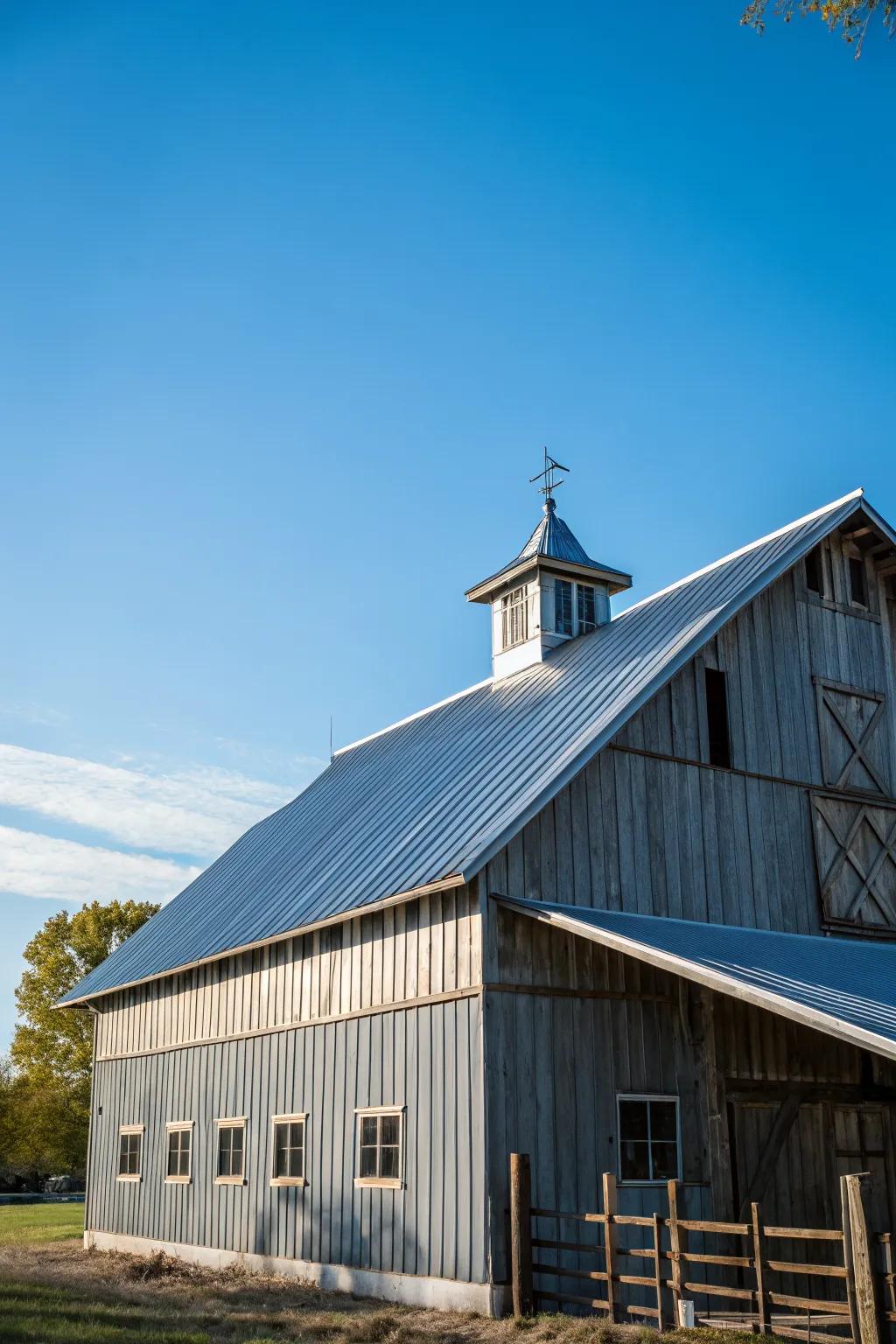 A barn with a durable and stylish metal roof.