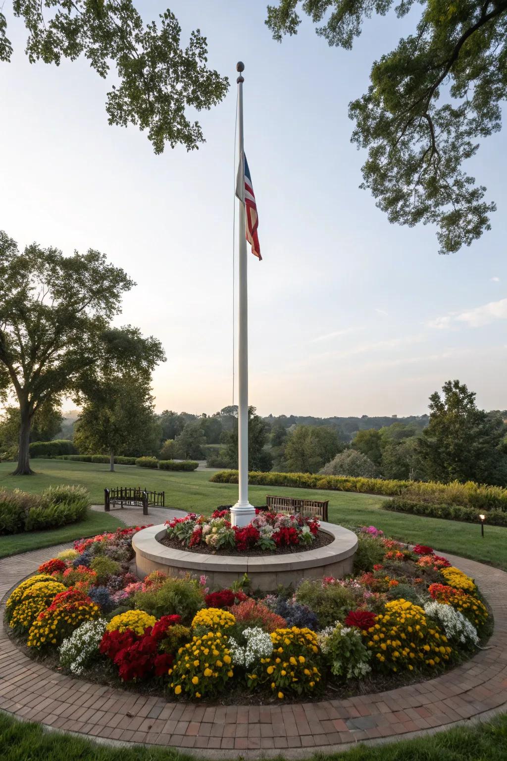 A colorful flower bed enhances the flagpole's charm.