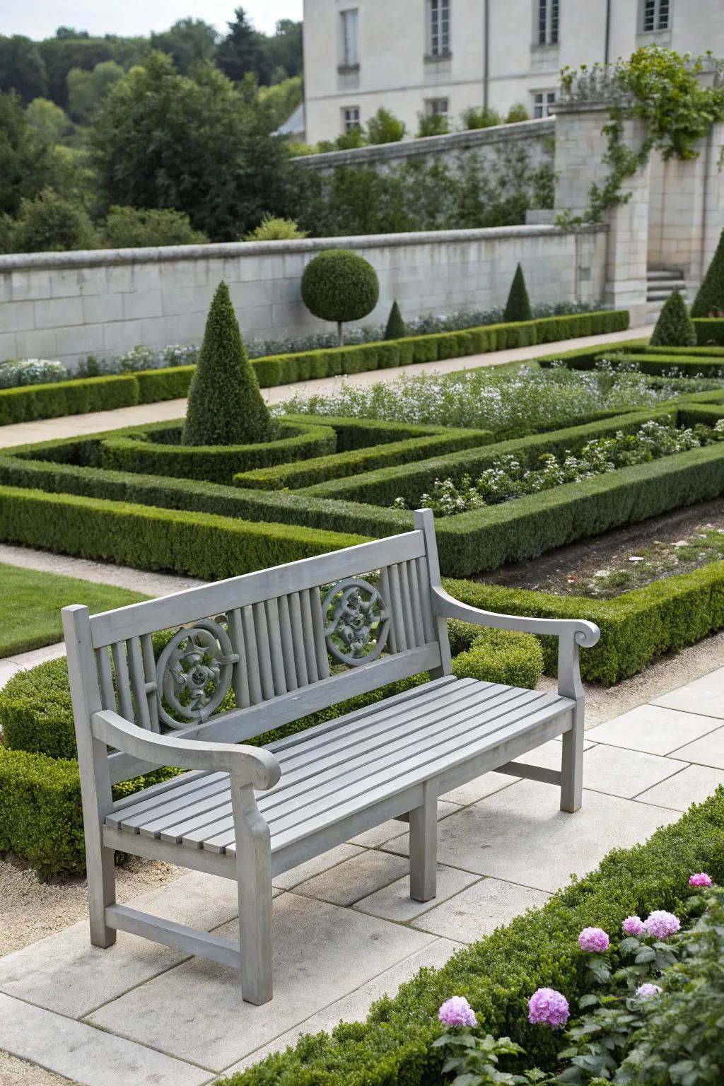 A gray bench offers a chic and modern touch to any garden.