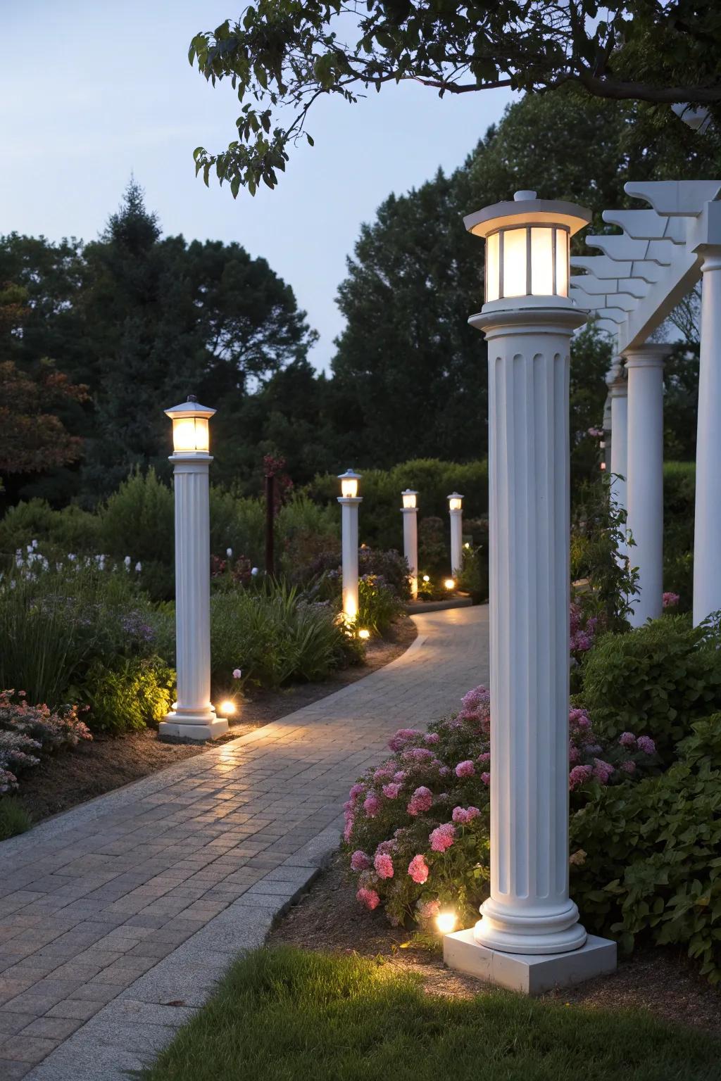 Illuminated light pillars create a magical nighttime garden experience.