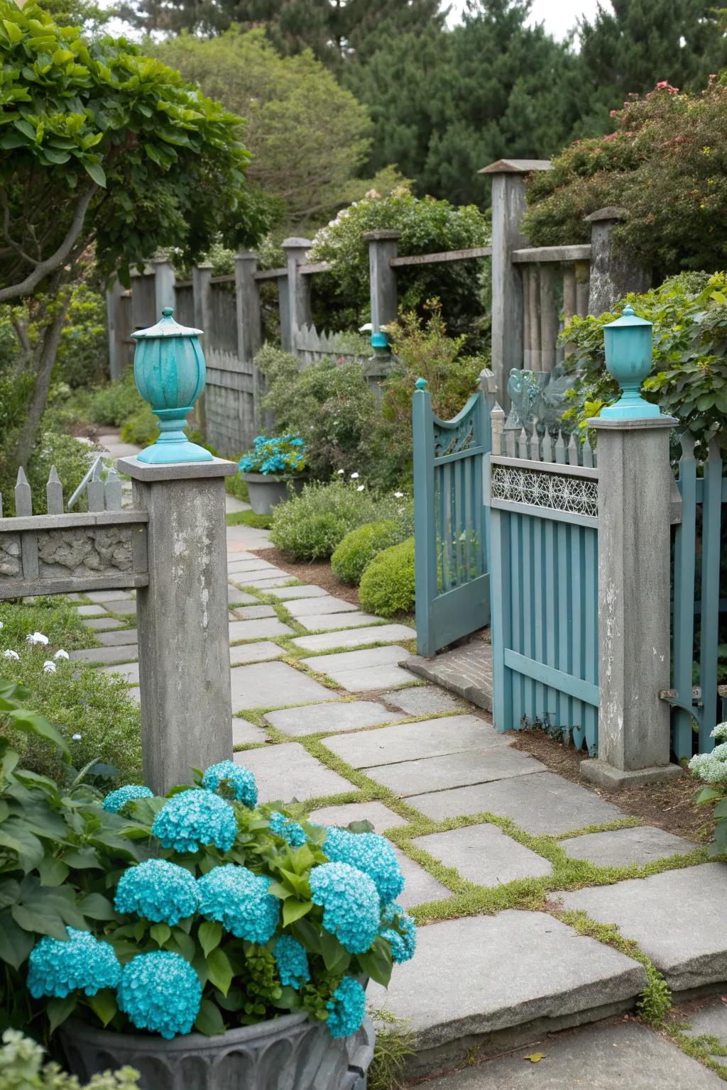 A garden with grey elements enhanced by bright teal accents for added vibrancy.