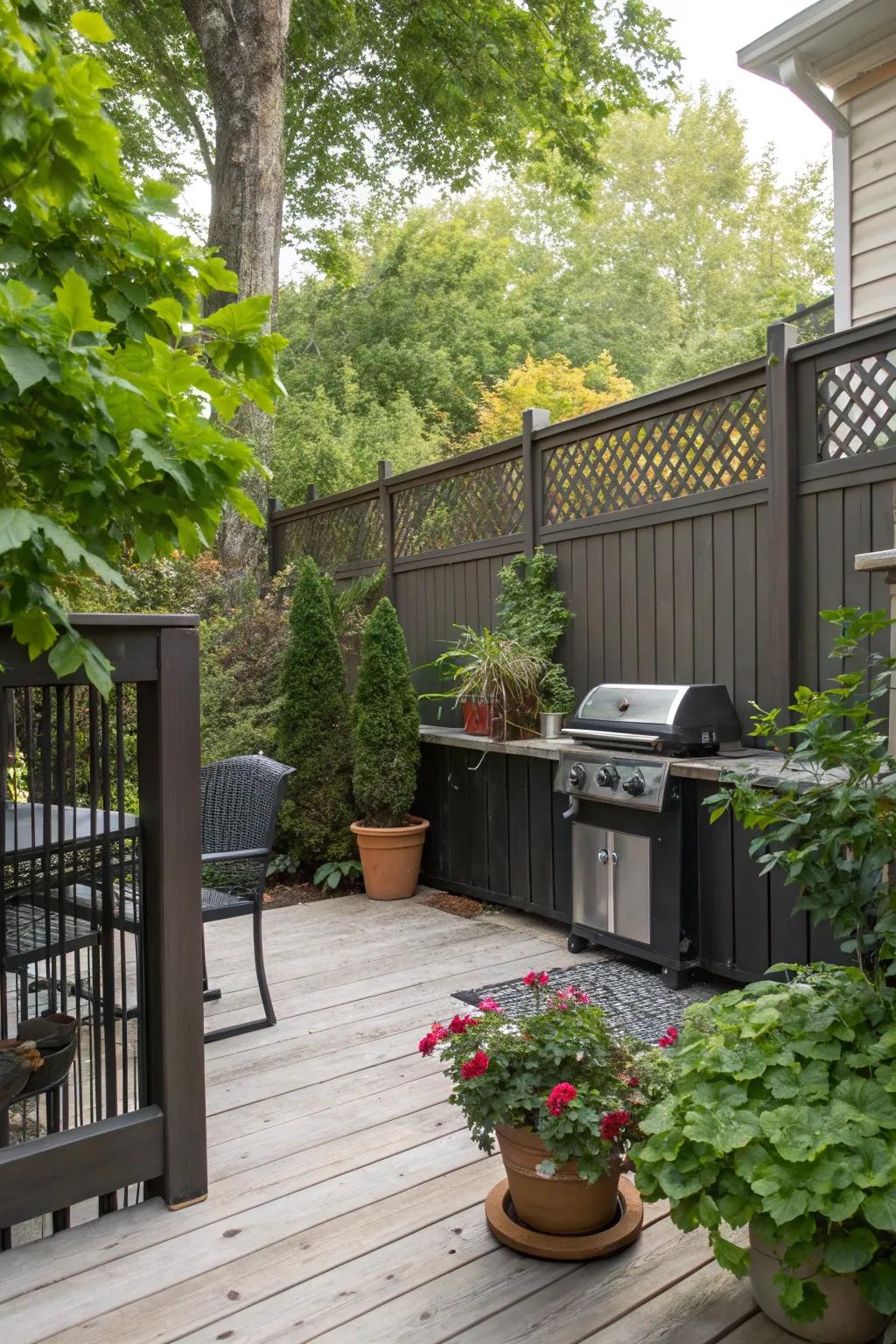 Privacy and greenery create a serene grilling oasis.